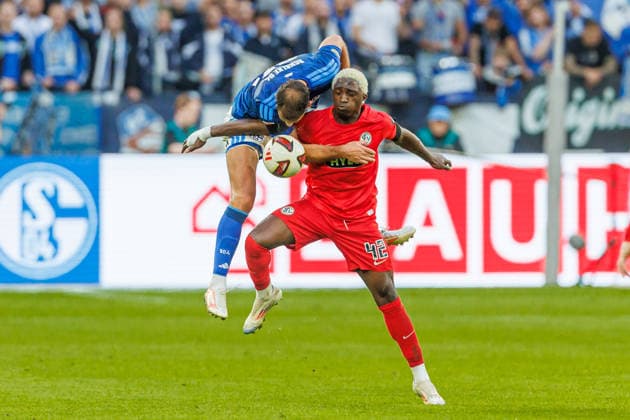 Nikola Katic of FC Schalke 04 and David Mokwa Ntusu of SV 07 Elversberg battle for the ball during the Bundesliga match between FC Schalke 04 and SV Elversberg at Veltins Arena on September 20, 2026, in Gelsenkirchen, Germany. Photo by Mario Hommes, DeFodi Images. Nikola Katic of FC Schalke 04 and David Mokwa Ntusu of SV 07 Elversberg battle for the ball during the Bundesliga match between FC Schalke 04 and SV Elversberg at Veltins Arena on September 20, 2026 in Gelsenkirchen, Germany Photo by Mario Hommes DeFodi Images DFB DFL REGULATIONS PROHIBIT ANY USE OF PHOTOGRAPHS AS IMAGE SEQUENCES AND OR QUASI-VIDEO Photo by Mario Hommes DeFodi Images