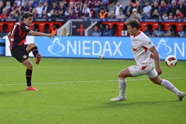 LEVERKUSEN - Miquel Gutierrez of Bayer 04 Leverkusen scores the 2-0 during the match between Bayer 04 Leverkusen and RB Leipzig at the Bay Arena on September 20, 2026 in Leverkusen, Germany. ANP Bundesliga 2026 27 xVIxANPxSportx xGerritxvanxKeulenxIVx 569419658 originalFilename: 569419658.jpg