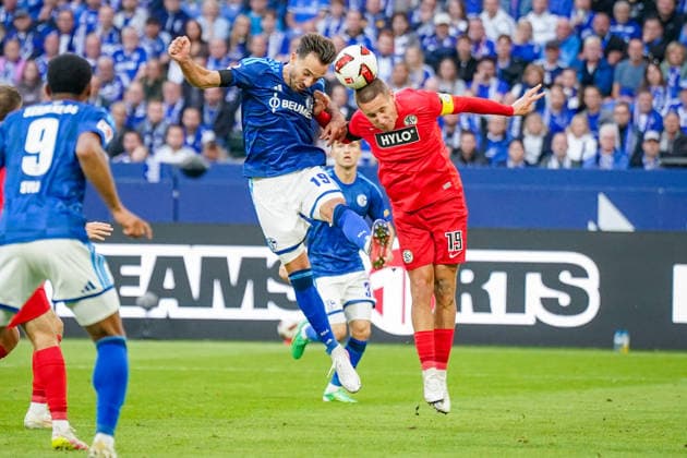 German Bundesliga 2026–2027, Matchday 4: FC Schalke 04 vs. SV Elversberg at Veltins Arena in Gelsenkirchen. Kenan Karaman (FC Schalke 04) and Lukas Pinckert (SV Elversberg), both 19, in a tackle. Copyright: xJOERANxSTEINSIEKx