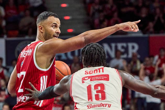 German Basketball Bundesliga (BBL), FC Bayern Munich Basketball vs. BMA365 Bamberg Baskets, Munich FC Bayern Basketball, Bamberg Baskets MBA365, September 20, 2026, in Munich, BMW Park; Johannes Thiemann, FC Bayern Basketball, Power Forward (PF), No. 32 (FCBB32); Trevon Scott, BMA365 Bamberg BASKETS, Power Forward (PF), No. 13 (BAM13); Sportworld Munich, BMW Park, Bavaria, Germany