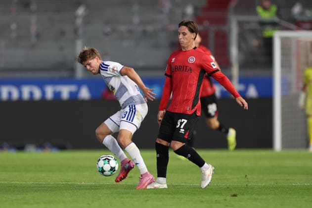 September 20, 2026, Soccer 3rd Division, SV Wehen Wiesbaden vs. MSV Duisburg, from left: Frederik Christensen (MSV Duisburg), Max Brandt (SV Wehen Wiesbaden). DFL and DFB regulations prohibit any use of photographs as image sequences and or quasi-video. xdcx Copyright: HMBxMedia Claus