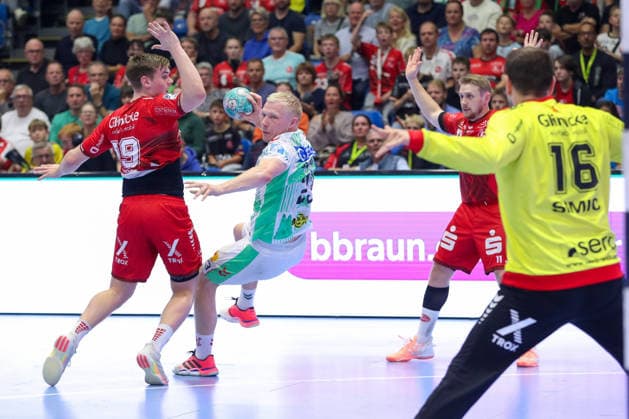 September 20, 2026, xgox, Handball Opel HBL MT Melsungen vs. SC Magdeburg emspor, from left: Magnus Saugstrup (Magdeburg), 23 shots on goal, goal scorers, scores a goal, goal, scores the goal (Kassel)