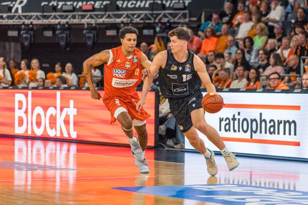 September 20, 2026, ratiopharm Ulm vs. MHP Riesen Ludwigsburg, Germany, Ulm, September 20, 2026, Basketball, Bundesliga, 2026–2027 season, ratiopharm Ulm vs. MHP Riesen Ludwigsburg; from left: Michael Rataj (ratiopharm Ulm), Patrick Cartier (MHP Riesen Ludwigsburg)