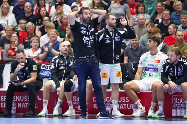 September 20, 2026, xgox, Handball Opel HBL MT Melsungen SC Magdeburg emspor, from left: Bennet Wiegert (Magdeburg), coach, Lukas Mertens (Magdeburg), 22, looks disappointed, dejected, disappointed Kassel
