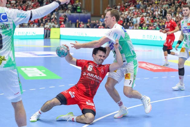 September 20, 2026, xgox, Handball Opel HBL MT Melsungen vs. SC Magdeburg emspor, from left: Erik Balenciaga (Melsungen), 6, Felix Claar (Magdeburg), 7; duel, battle, tackle, Kassel