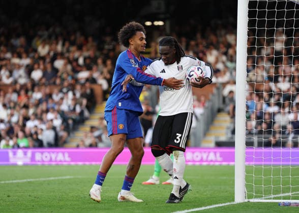 20th September 2026; Craven Cottage, London, England; Premier League Football, Fulham versus Manchester United, ManU Calvin Bassey of Fulham refusing to give the ball to Joshua Zirkzee of Manchester United JohnxPatrickxFletcher