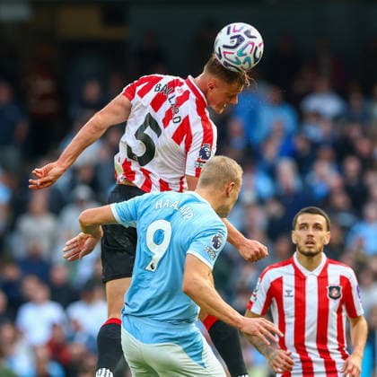 20th September 2026; Etihad Stadium, Manchester, England; Premier League Football, Manchester City versus Sunderland; Daniel Ballard of Sunderland beats Erling Haaland of Manchester City to the ball RogerxEvans