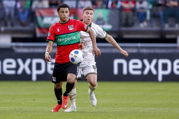 NIJMEGEN , 20-09-2026 , Stadium De Goffert , season 2026 2027 , Dutch Eredivisie football . match between NEC Nijmegen and Go Ahead Eagles, Final result 1-1, Picture shows NEC Nijmegen player Dele Thomas GA Eagles player Alfons Sampsted NEC - Go Ahead Eagles  x207340448x Copyright: