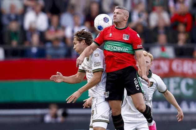 NIJMEGEN , 20-09-2026 , Stadium De Goffert , season 2026 2027 , Dutch Eredivisie football . match between NEC Nijmegen and Go Ahead Eagles, Final result 1-1, Picture shows GA Eagles player Evert Linthorst NEC Nijmegen player Bryan Linssen NEC - Go Ahead Eagles  x207340450x Copyright:
