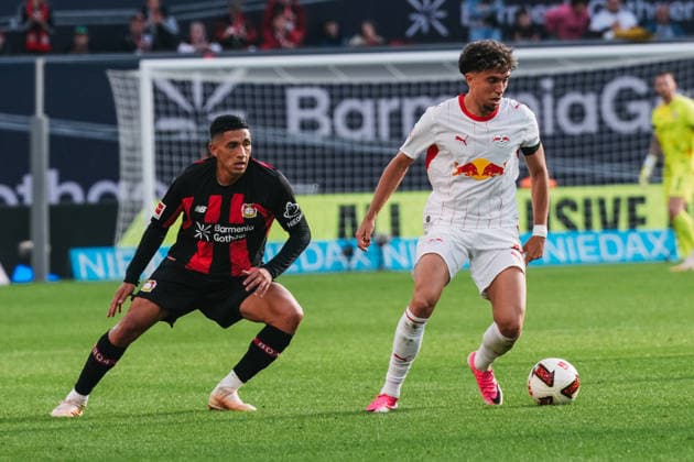September 20, 2026, xjmrgnx, Soccer, Bundesliga 1, Bayer 04 Leverkusen vs. RB Leipzig: A tackle between Equi Fernandez (6), Leverkusen, and Neil El Aynaoui (21), Leipzig. DFL and DFB regulations prohibit any use of photographs as image sequences and or quasi-video. Leverkusen