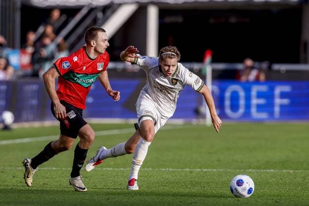 NIJMEGEN , 20-09-2026 , Stadium De Goffert , season 2026 2027 , Dutch Eredivisie football . match between NEC Nijmegen and Go Ahead Eagles, Final result 1-1, Picture shows NEC Nijmegen player Darko Nejasmic GA Eagles player Evert Linthorst NEC - Go Ahead Eagles  x207340476x Copyright: