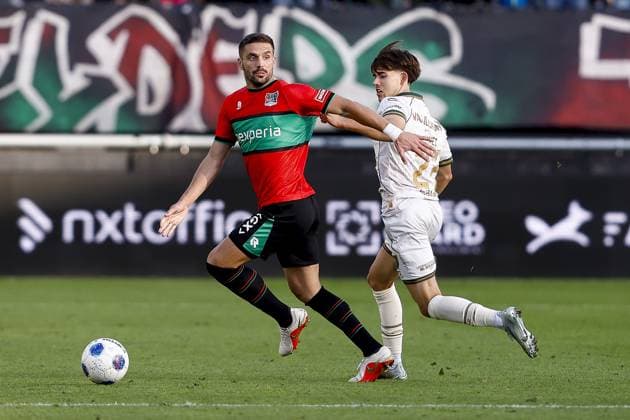 NIJMEGEN , 20-09-2026 , Stadium De Goffert , season 2026 2027 , Dutch Eredivisie football . match between NEC Nijmegen and Go Ahead Eagles, Final result 1-1, Picture shows NEC Nijmegen player Dusan Tadic GA Eagles player Tomas Galvez NEC - Go Ahead Eagles  x207340478x Copyright: