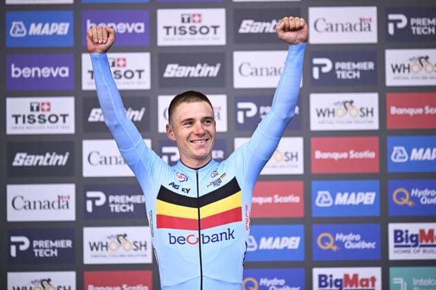 World champion Belgian Remco Evenepoel celebrates on the podium the men s elite individual time trial race (39,2km) at the cycling UCI Road World Championship, WM, Weltmeisterschaft in Montreal, Canada, Sunday 20 September 2026. JASPERxJACOBS  x187202821x