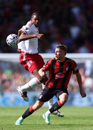 Bournemouth, England, 20th September 2026. Jeremy Jacquet of Liverpool and Adrien Truffert of AFC Bournemouth challenge for the ball during the AFC Bournemouth vs Liverpool Premier League match at the Vitality Stadium, Bournemouth. Picture credit should read: Paul Terry Sportimage EDITORIAL USE ONLY. No use with unauthorised audio, video, data, fixture lists, club league logos or live services. Online in-match use limited to 120 images, no video emulation. No use in betting, games or single club league player publications. SPI_067_PT_Bournemouth_Liverpool SPI-5013-0065