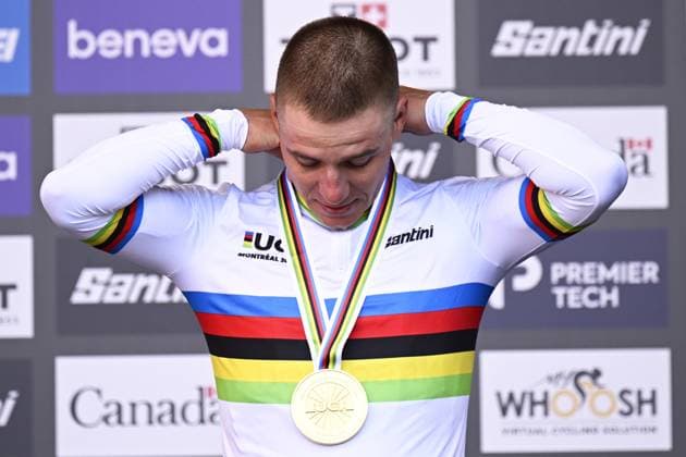 World champion Belgian Remco Evenepoel celebrates on the podium the men s elite individual time trial race (39,2km) at the cycling UCI Road World Championship, WM, Weltmeisterschaft in Montreal, Canada, Sunday 20 September 2026. JASPERxJACOBS  x187204840x