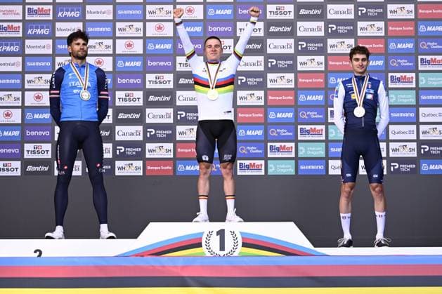 L-R, silver medalist, Italy s Filippo Ganna; winner world champion Belgium s Remco Evenepoel and bronze medalist France s Paul Seixas celebrate on the podium of the men s elite individual time trial race (39,2km) at the cycling UCI Road World Championship, WM, Weltmeisterschaft in Montreal, Canada, Sunday 20 September 2026. JASPERxJACOBS  x187204857x