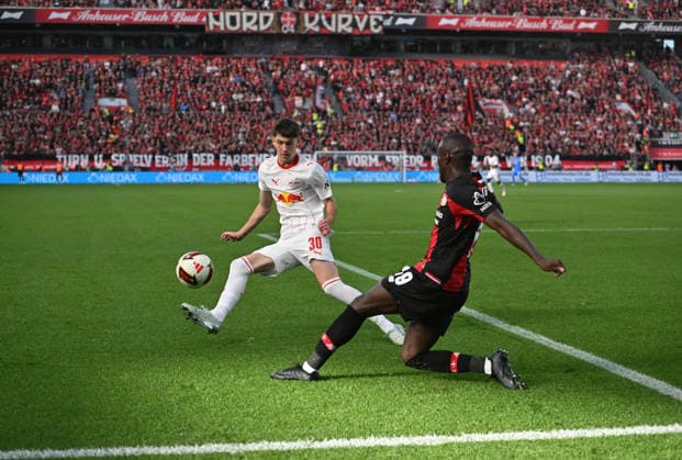 l r Andrija Maksimovic, RB Leipzig, Moussa Diaby, Bayer Leverkusen—action, tackle—soccer, Bundesliga 1, Matchday 4, Bayer 04 Leverkusen vs. RB Leipzig, on September 20, 2026, in Leverkusen, Germany. DFL regulations prohibit any use of photographs as image sequences and or quasi-video.