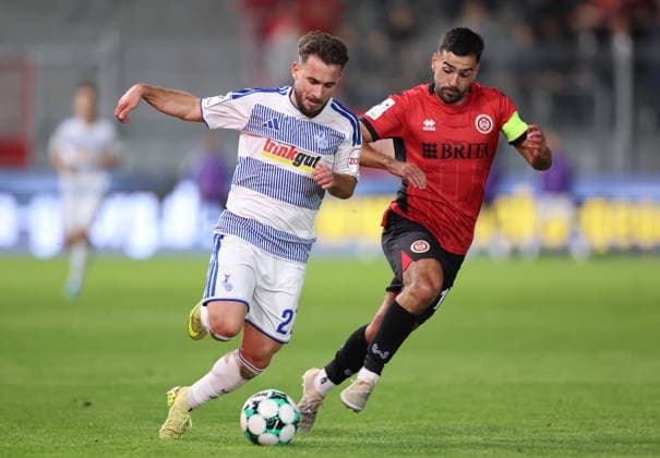 September 20, 2026, Soccer 3rd Division, SV Wehen Wiesbaden vs. MSV Duisburg, from left: Can Coskun (MSV Duisburg), Tarik Gözüsirin (SV Wehen Wiesbaden). DFL and DFB regulations prohibit any use of photographs as image sequences and or quasi-video. xdcx Copyright: HMBxMedia Claus