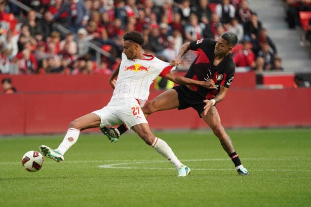 Leverkusen Soccer, 2026–2027 Bundesliga Season: Bayer 04 Leverkusen vs. RB Leipzig, September 20, 2026, BayArena, Leverkusen; Tidium Diadie, Stephan Gomis, RB Leipzig; Ezequiel Fernandez, Bayer 04 Leverkusen; Argentina, ARG