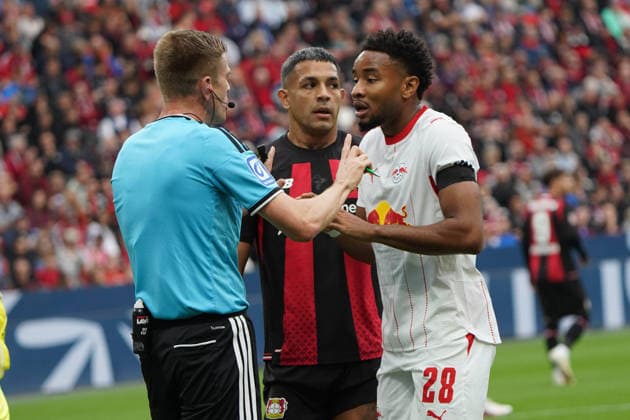 Leverkusen Soccer, Bundesliga Season 2026–2027: Bayer 04 Leverkusen vs. RB Leipzig, September 20, 2026, BayArena, Leverkusen; Robert Schröder, Referee; Christopher Nkunku (RB Leipzig), Action, Still Image