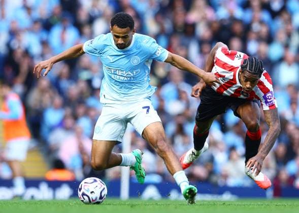 Iliman Ndiaye of Manchester City and Dayann Methalie of Sunderland Manchester City v Sunderland, Premier League, Football, Etihad Stadium, Manchester, UK - 20 Sep 2026Manchester Etihad Stadium United Kingdom EDITORIAL USE ONLY No use with unauthorised audio, video, data, fixture lists, club league logos or live services. Online in-match use limited to 120 images, no video emulation. No use in betting, games or single club league player publications. Copyright: xMattxWest Shutterstockx 17160119ck