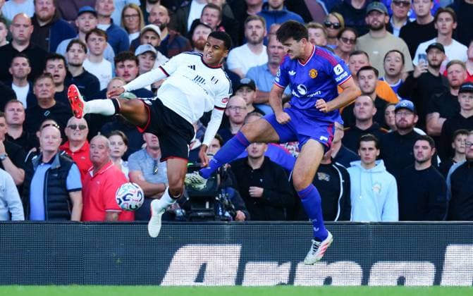 Harry Maguire of Manchester United, ManU and Shea Charles of Fulham Fulham v Manchester United, Premier League, Football, Craven Cottage, London, UK - 20 Sep 2026London Craven Cottage United Kingdom EDITORIAL USE ONLY No use with unauthorised audio, video, data, fixture lists, club league logos or live services. Online in-match use limited to 120 images, no video emulation. No use in betting, games or single club league player publications. Copyright: xJavierxGarcia Shutterstockx 17160117fa