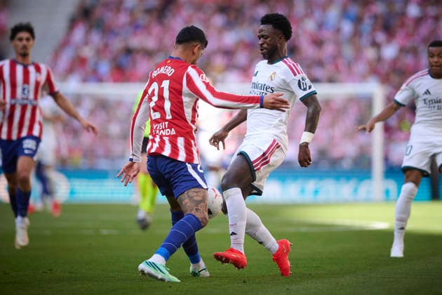 Atletico de Madrid™s Cuti Romero (l) and Real Madrid CF™s Vinicius Junior during La Liga match. September 20 ,2026. (20260920180)