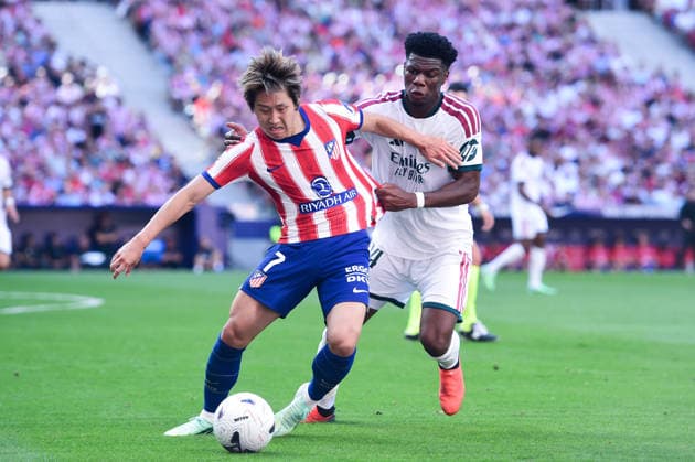 (260921) -- MADRID, Sept. 21, 2026 -- Atletico de Madrid s Lee Kang-In (L) vies with Real Madrid s Tchouameni during a La Liga football match between Atletico de Madrid and Real Madrid at Riyadh Air Metropolitano stadium in Madrid, Spain, on Sept. 20, 2026. (Photo by Xinhua) (SP)SPAIN-MADRID-FOOTBALL-LALIGA-ATLETICO MADRID VS REAL MADRID GustavoxValiente 