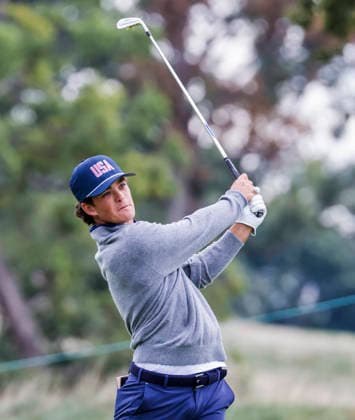 Jackson Koivun of the US hits on the fourteenth hole during practice for the Presidents Cup golf tournament at Medinah Country Club in Medinah, Illinois on Monday, September 21, 2026. Competition between the USA and the International team begins on Thursday, September 24 with Four-Ball play.  MED20260922802 TANNENxMAURY