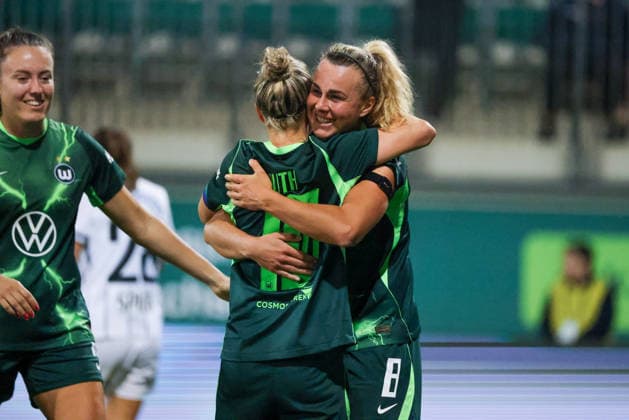 Wolfsburg, Germany, September 23, 2026 UEFA Women’s Europa Cup First Leg: VfL Wolfsburg Women vs. Sturm Graz Women. Pictured, from left: Lena Lattwein (third goal scorer), who scored Wolfsburg’s sixth goal to make it 6–1, celebrating with Mara Alber and Svenja Huth, both of Wolfsburg. Copyright: HMBxMedia MadeleinexFantini