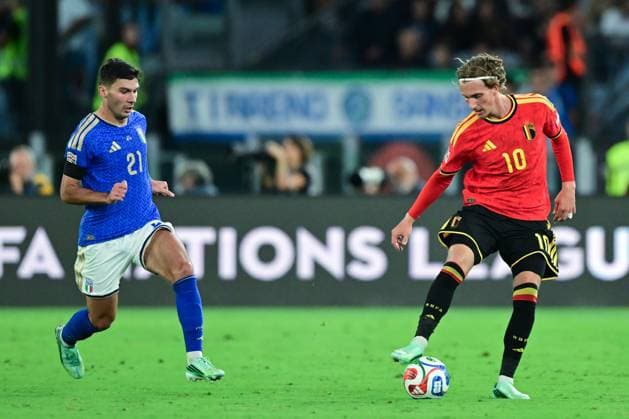 Italian NIcolo Cambiaghi and Belgium s Mika Godts fight for the ball during a soccer game between the Red Devils, the Belgian national soccer team and Italy for the opening game of the UEFA Nations League, in Rome, on Friday 25 September 2026. DIRKxWAEM  x187825342x