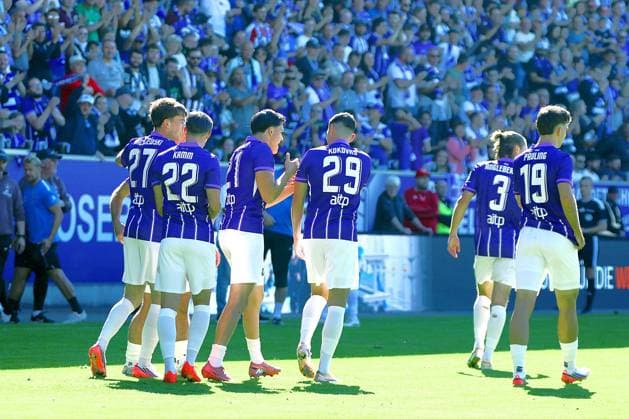 Celebrations after the 1-0 win, with goal scorer Tim Maciejewski at the center. Aue Soccer, Northeast Regional League 2026-27: FC Erzgebirge Aue vs. Chemie Leipzig on September 27, 2026. Erzgebirge Aue vs. Chemie Leipzig