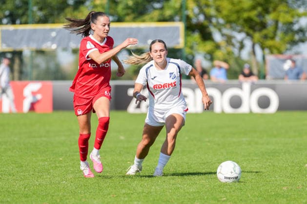 DFB Women s Cup: SC Sand vs. VfL Wolfsburg, September 27, 2026. A tackle between Joelle Wedemeyer (VfL Wolfsburg, No. 24) and Pija Reininger (SC Sand, No. 9). DFB Women s Cup: SC Sand vs. VfL Wolfsburg, Adams Arena, September 27, 2026 DFB and DFL regulations prohibit any use of photographs as image sequences and or quasi-video Copyright: xBEAUTIFULxSPORTS Boscox