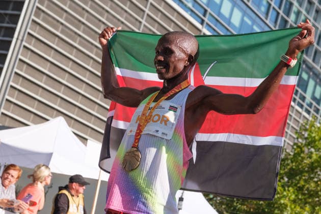 September 27, 2026, Warsaw, Masovian Voivodeship, Poland: STEPHEN KIBOR of Kenya holds up a Kenyan flag at the finish line after placing first in the 48th Warsaw Marathon. The race has been awarded the World Athletics Elite Label for the first time in its history and is part of the European Marathon Classics (EMC) series of races. Warsaw Marathon 2026  - ZUMAk204 20260927_zip_k204_022 Copyright: xRomanxKozielx