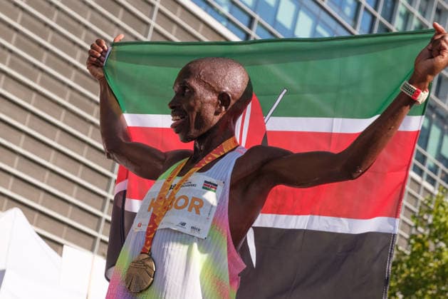 September 27, 2026, Warsaw, Masovian Voivodeship, Poland: STEPHEN KIBOR of Kenya holds up a Kenyan flag at the finish line after placing first in the 48th Warsaw Marathon. The race has been awarded the World Athletics Elite Label for the first time in its history and is part of the European Marathon Classics (EMC) series of races. Warsaw Marathon 2026  - ZUMAk204 20260927_zip_k204_023 Copyright: xRomanxKozielx
