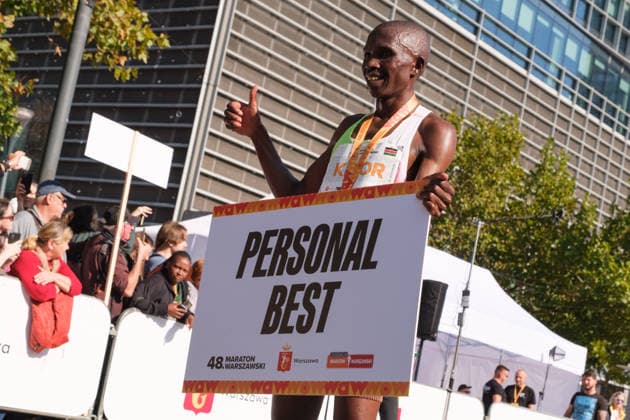 September 27, 2026, Warsaw, Masovian Voivodeship, Poland: STEPHEN KIBOR of Kenya holds up a personal best record sign at the finish line after placing first in the 48th Warsaw Marathon. The race has been awarded the World Athletics Elite Label for the first time in its history and is part of the European Marathon Classics (EMC) series of races. Warsaw Poland - ZUMAk204 20260927_zip_k204_021 Copyright: xRomanxKozielx