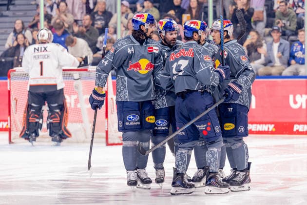 Trevor Carrick, EHC Red Bull Munich, 44, Ryan Murphy, EHC Red Bull Munich, 24; Yasin Ehliz, EHC Red Bull Munich, 42; and Lucas Thaler, EHC Red Bull Munich, 48, celebrate with Taro Hirose, EHC Red Bull Munich, 17, after his goal to make it 1–0 for GER, EHC Red Bull Munich vs. Löwen Frankfurt ice hockey, DEL, 2026–2027 season, Matchday 4, September 27, 2026. Photo: HMB Media, Heike Feiner Copyright: HMBxMedia HeikexFeiner