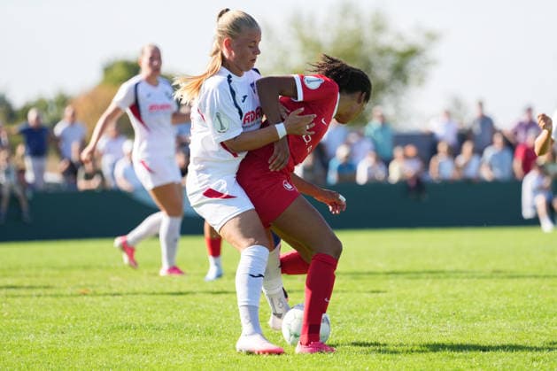 DFB Women s Cup: SC Sand vs. VfL Wolfsburg, September 27, 2026. A tackle between Kim Schneider (SC Sand, No. 8) and Cora Zicai (VfL Wolfsburg, No. 28). DFB Women s Cup: SC Sand vs. VfL Wolfsburg, Adams Arena, September 27, 2026 DFB and DFL regulations prohibit any use of photographs as image sequences and or quasi-video Copyright: xBEAUTIFULxSPORTS Boscox