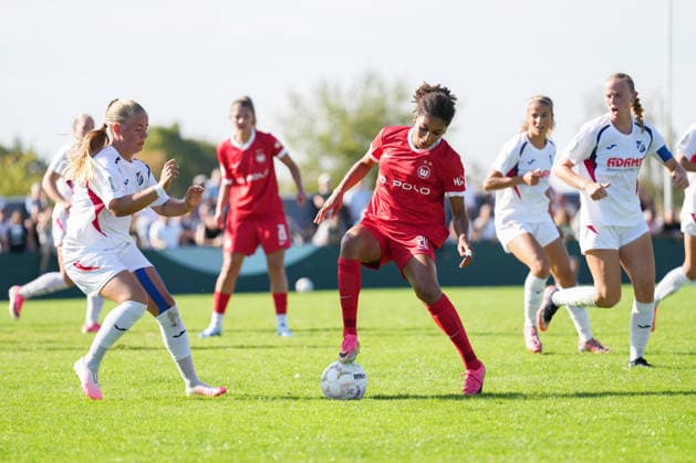 DFB Women s Cup: SC Sand vs. VfL Wolfsburg, September 27, 2026. A tackle between Kim Schneider (SC Sand, No. 8) and Cora Zicai (VfL Wolfsburg, No. 28). DFB Women s Cup: SC Sand vs. VfL Wolfsburg, Adams Arena, September 27, 2026 DFB and DFL regulations prohibit any use of photographs as image sequences and or quasi-video Copyright: xBEAUTIFULxSPORTS Boscox