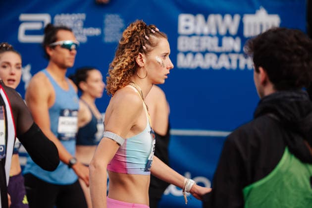 27.09.26, BMW Berlin Marathon 2026, Berlin Esther Pfeiffer (GER) stands near other runners in front of a BMW Berlin-Marathon backdrop in Berlin, Germany. Berlin Berlin BE Deutschland