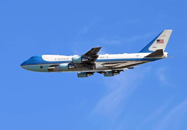 Air Force One flies over as President Donald Trump arrives to watch the final day of the 2026 President s Cup golf tournament at Medinah Country Club in Chicago, Illinois, on Sunday, September 27, 2026.  CHI20260927701 MARKxBLACK