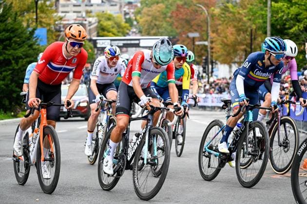The pack of riders pictured in action during the elite men Road Race race (273,7 km) at the cycling World Championship, WM, Weltmeisterschaft in Montreal, Canada, Sunday 27 September 2026. The UCI road world championships are taking place from 20 to 27 September, in Montreal, Canada. JASPERxJACOBS  x187989211x