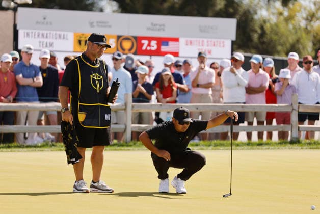 International team player Ryo Hisatsune of Japan lines up a putt on the second hole during a singles match on the final day of the 2026 President s Cup golf tournament at Medinah Country Club in Chicago, Illinois, on Sunday, September 27, 2026.  CHI20260927716 TANNENxMAURY