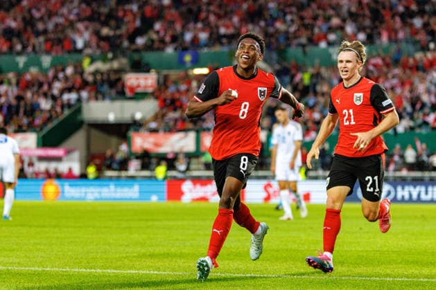 VIENNA, AUSTRIA - 27 SEPTEMBER 2026: Image shows Adamu Junior (Austria, 8) and Wimmer Patrick (Austria, 21) celebrating the second goal for Austria during UEFA Nations League 2026 27 League B, Group B3, Matchday 2: Austria vs Kosovo at Ernst-Happel-Stadion on 27 09 2026 in Vienna, Austria. Austria Copyright: xFröhlichxPascalx