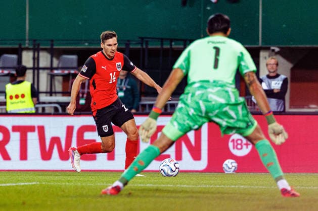 VIENNA, AUSTRIA - 27 SEPTEMBER 2026: Image shows Veratschnig Nikolas (Austria, 14) and MuriÄ‡ Arijanet (Kosovo, 1) during UEFA Nations League 2026 27 League B, Group B3, Matchday 2: Austria vs Kosovo at Ernst-Happel-Stadion on 27 09 2026 in Vienna, Austria. Austria Copyright: xFröhlichxPascalx