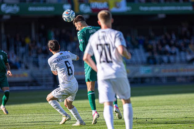 UEFA National League - League - Round 2 Lithuania Dariaus ir Gineno stadionas Gytis Gineitis wins an aerial duel against Khaybulaev during the UEFA Nations League match between Lithuania and Azerbaijan at Dariaus ir Gireno Stadium in Kaunas, Lithuania. Kaunas Kaunas Lithuania