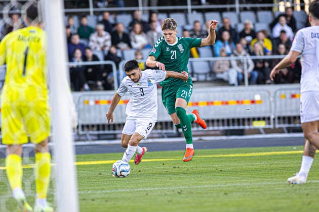 UEFA National League - League - Round 2 Lithuania Dariaus ir Gineno stadionas Adrijan Lickunas challenges Rüfat Abbasov during the UEFA Nations League match between Lithuania and Azerbaijan at Dariaus ir Gireno Stadium in Kaunas, Lithuania. Kaunas Kaunas Lithuania