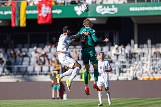UEFA National League - League - Round 2 Lithuania Dariaus ir Gineno stadionas Armandas Kucys wins an aerial duel against Azebaijanian during the UEFA Nations League match between Lithuania and Azerbaijan at Dariaus ir Gireno Stadium in Kaunas, Lithuania. Kaunas Kaunas Lithuania