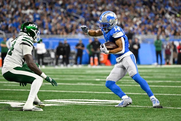 Sep 27, 2026; Detroit, MI, USA; Detroit Lions wide receiver Amon-Ra St. Brown (14) tries to juke New York Jets linebacker Jamien Sherwood (44) at Ford Field. Mandatory Credit: -Cal Media Detroit USA - ZUMAc04_ 20260927_zma_c04_023 Copyright: xAllanxDranbergx