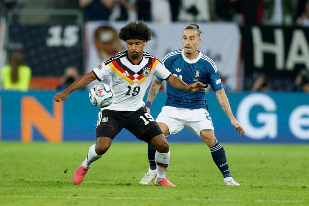 From left to right: Karim Adeyemi of Germany and Kostas Tsimikas of Greece, in action during the UEFA Nations League match between Germany and Greece at the WWK Arena in Augsburg, Germany, on September 27, 2026, Augsburg, Germany, on September 27, 2026 Copyright: HMBxMedia xHeikoxBecker
